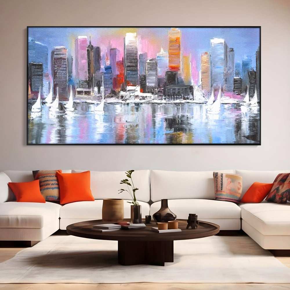 Tablou canvas cu pictura peisaj urban cu vele pe apa, in rama de aluminiu negru, pe perete intr-un living